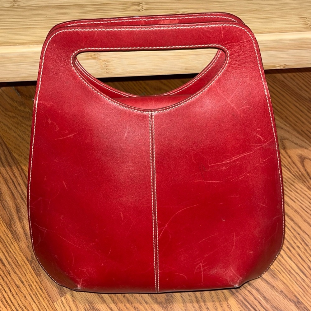 Lancel Red Leather hard shell handbag.